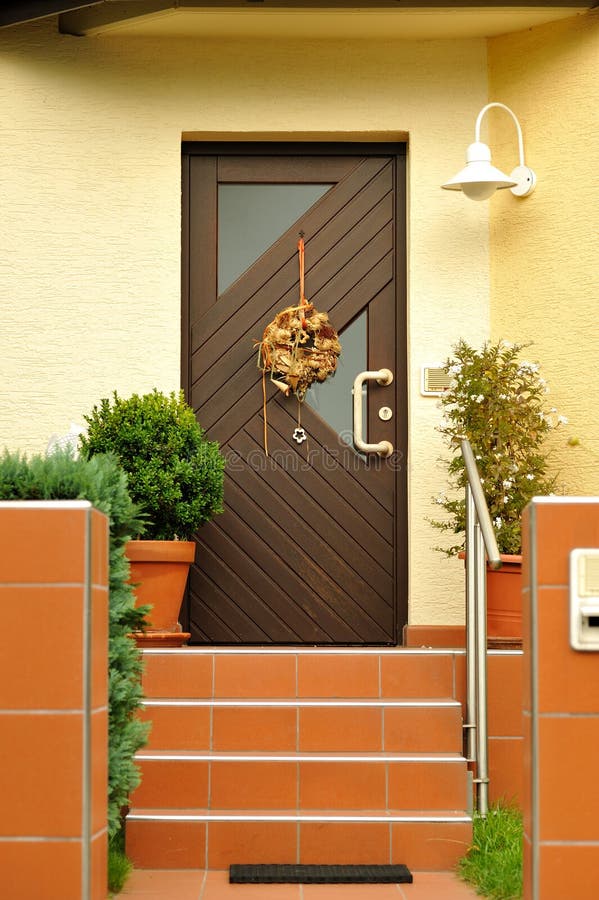 Front door of the modern house. Front view of an modern house door entrance royalty free stock photos